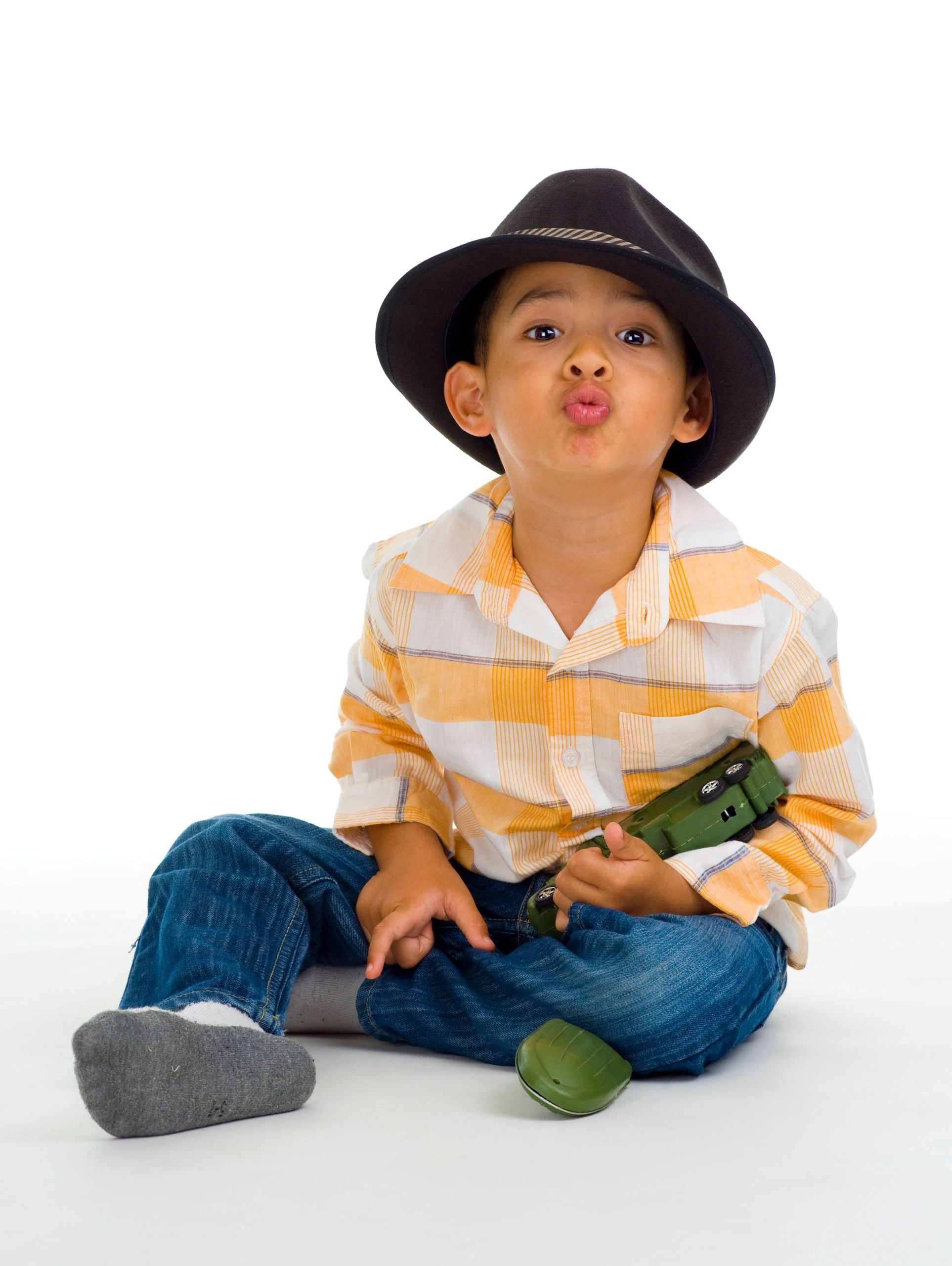 Child playing with music props