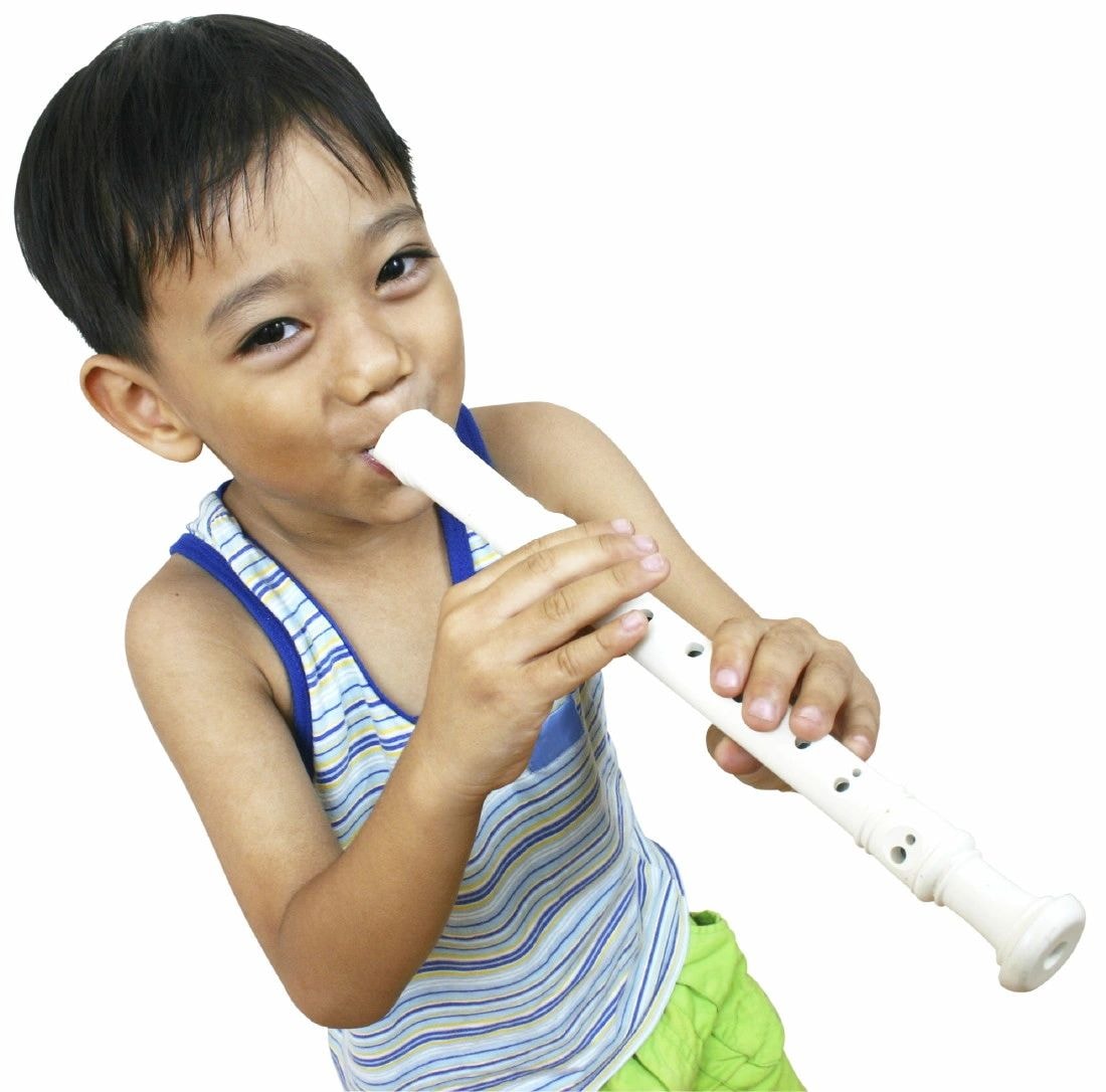 Young boy playing recorder